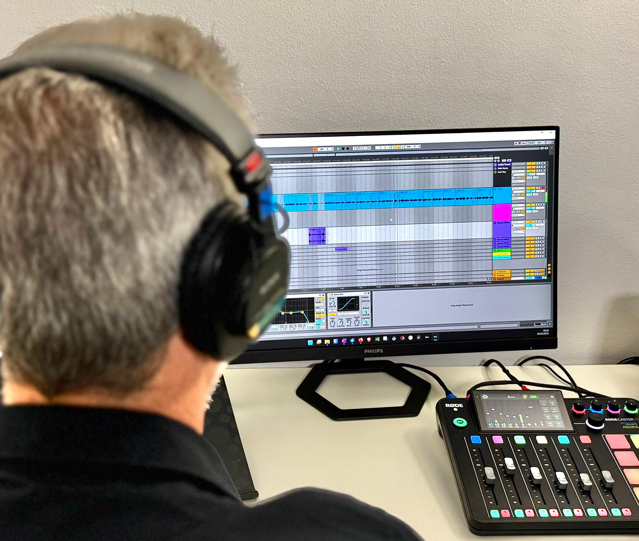 Podcast Editing Image of sound engineer editing a podcast
